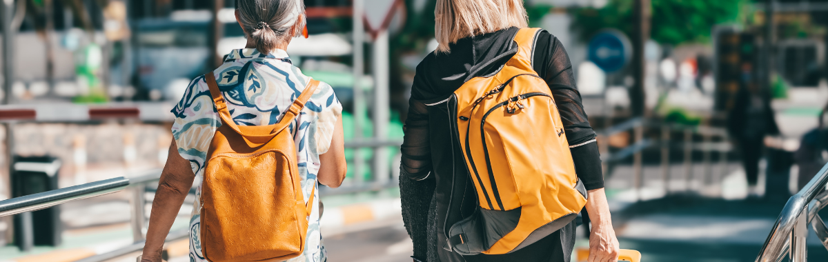travelers walking together with backpacks 