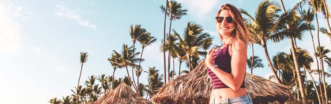 happy traveler with palm trees