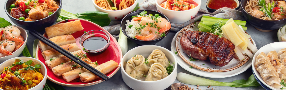 Buffet filled with traditional Asian food