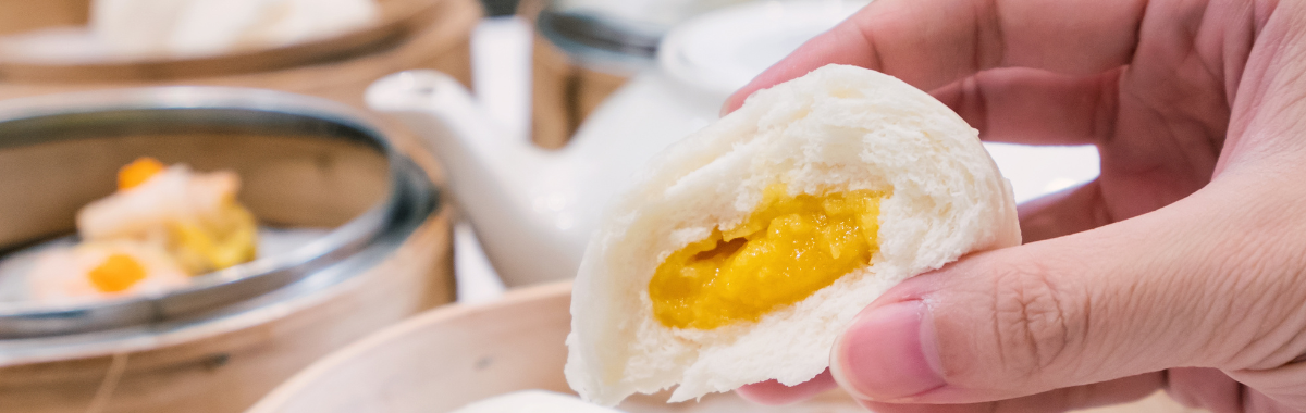 steamed buns and tea being eaten 