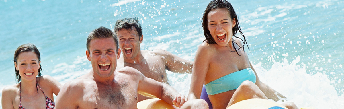 Spring break vacation fun header image with Millenials at the beach