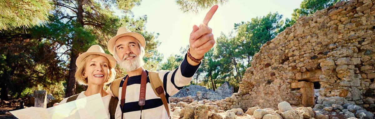 secior couple hiking on a trip