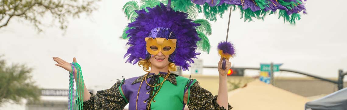 costumed Mardi Gras partier