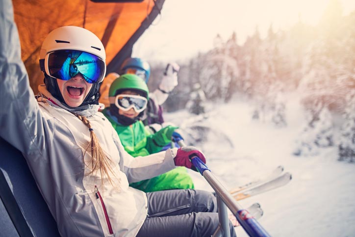 family on a ski lift