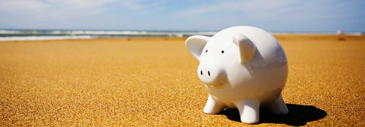 piggy bank on a beach