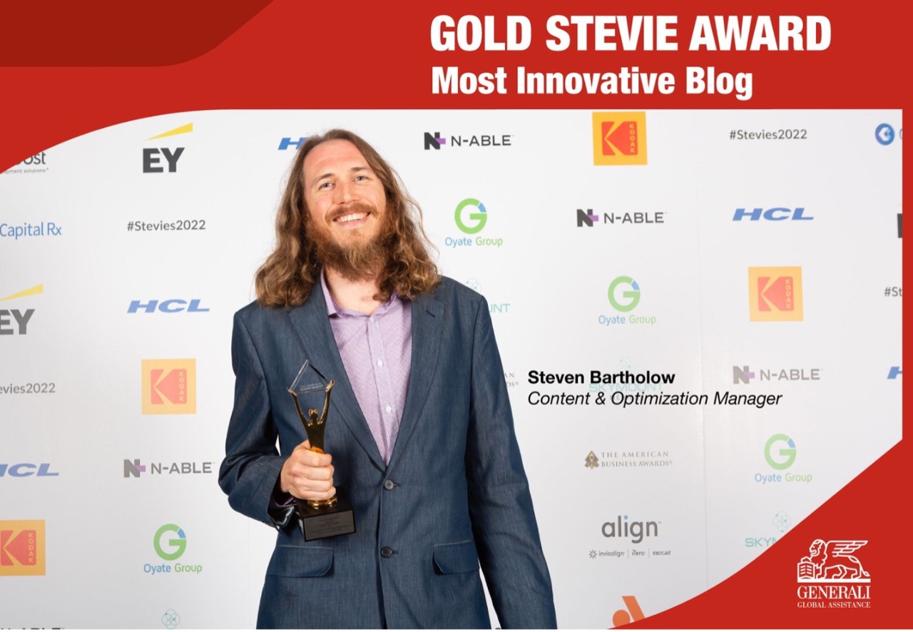 Steven Bartholow is shown receiving a gold Stevie® award in the 20th Annual American Business Awards for the Most Innovative Business Blog