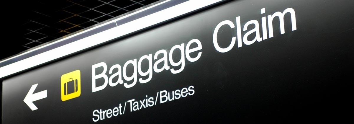 baggage claim sign at the airport