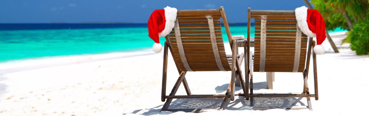 santa hats on beach chairs