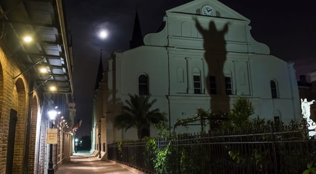 church at night, statue reflection, palm tree, building lights, clock, 2 am, moon, clouds, fence, trees