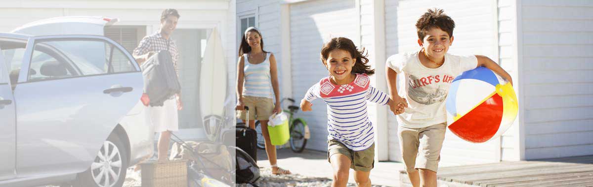 family with kids running at a beach vacation rental