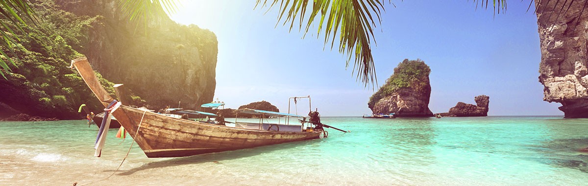 boat on a beach in Thailand